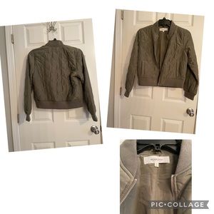 Green cropped jacket. Size small, no tags but never worn.